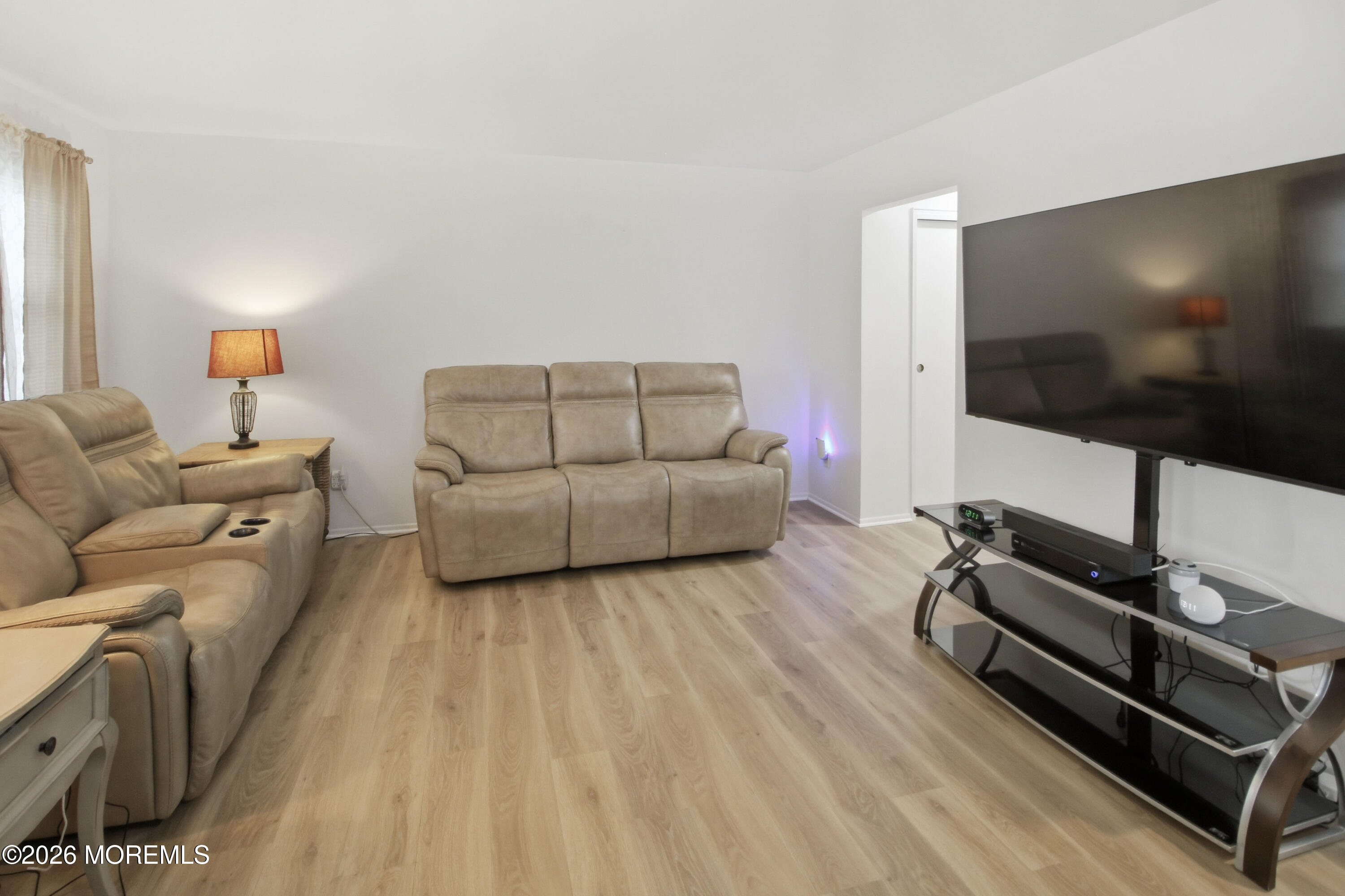 22 A Roosevelt City Road Whiting, NJ 08759 - Photo 4 of 18 a living room with furniture and a flat screen tv