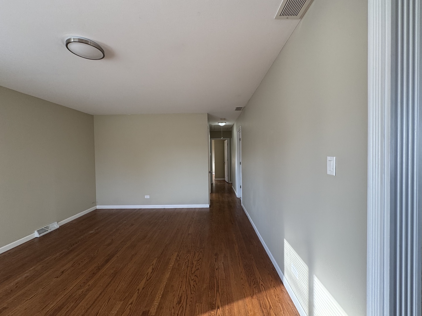 7838 West 73rd Place Bridgeview, IL 60455 - Photo 12 of 22 a view of hallway with wooden floor