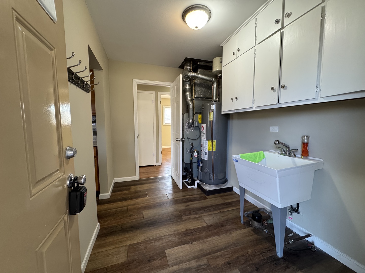 7838 West 73rd Place Bridgeview, IL 60455 - Photo 17 of 22 a view of an entryway and wooden floor