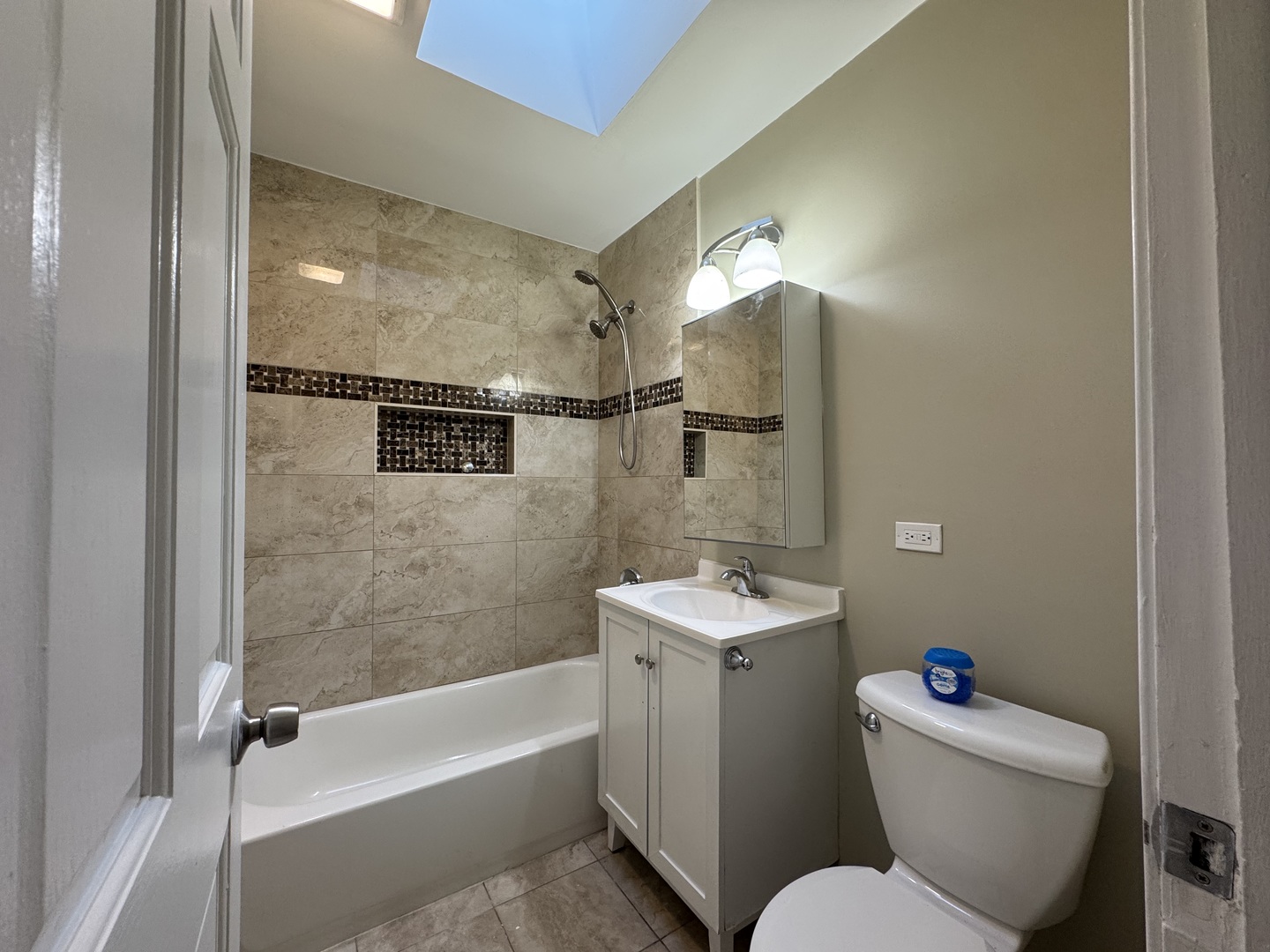 7838 West 73rd Place Bridgeview, IL 60455 - Photo 8 of 22 a bathroom with a toilet a sink and bathtub