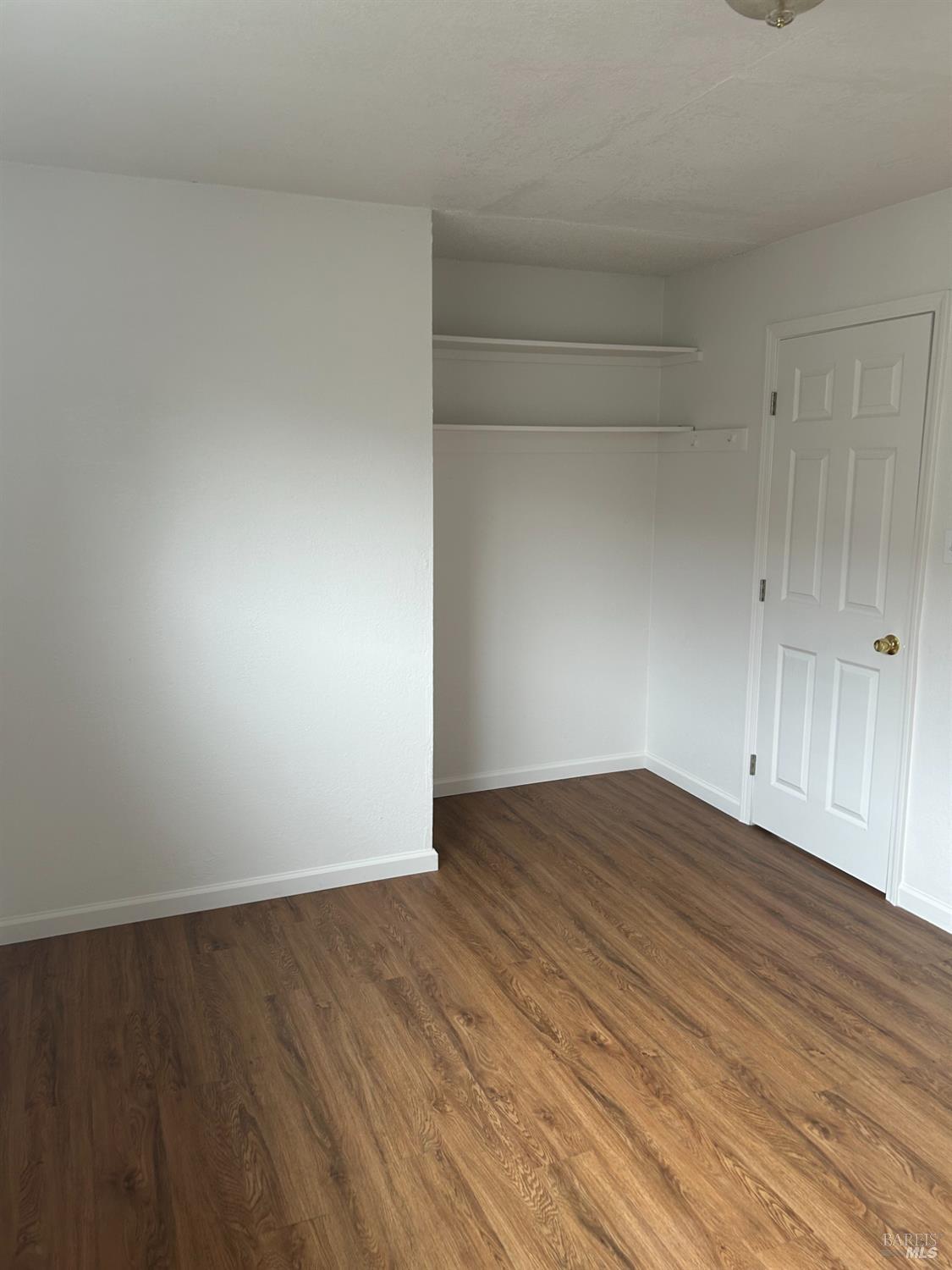 243 Sage Street Vallejo, CA 94589 - Photo 6 of 9 a view of an empty room and wooden floor
