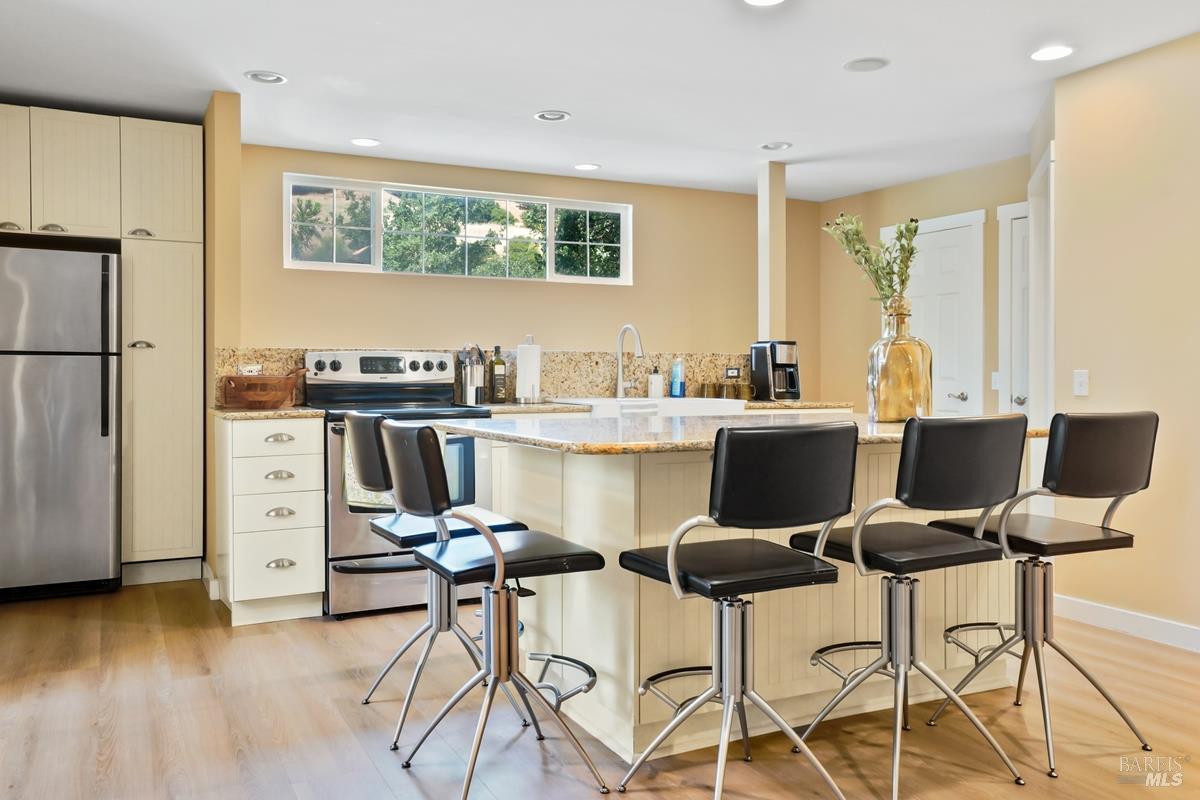 1846 Indian Valley Road, Unit A Novato, CA 94947 - Photo 24 of 45 a view of a dining room with furniture and wooden floor