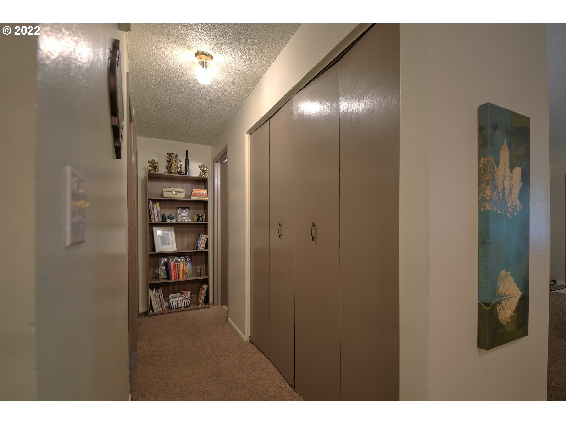 358 South 51st Place Springfield, OR 97478 - Photo 8 of 26 a view of a hallway with wooden floor