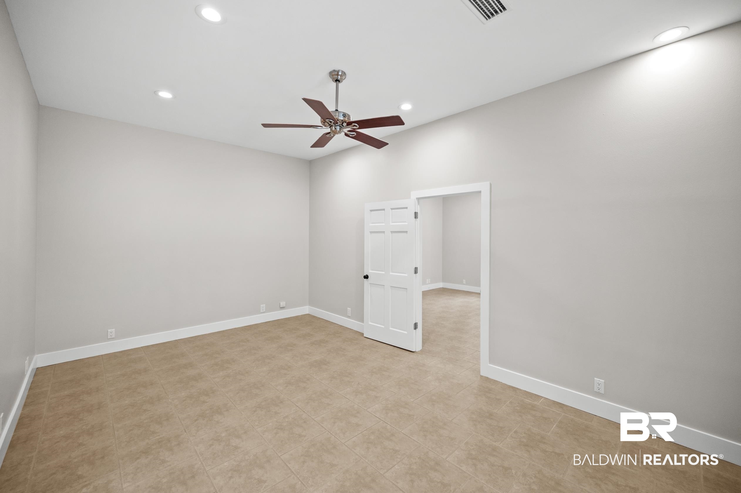 15031 Timber Ridge Drive Loxley, AL 36551 - Photo 24 of 43 Tiled spare room featuring ceiling fan