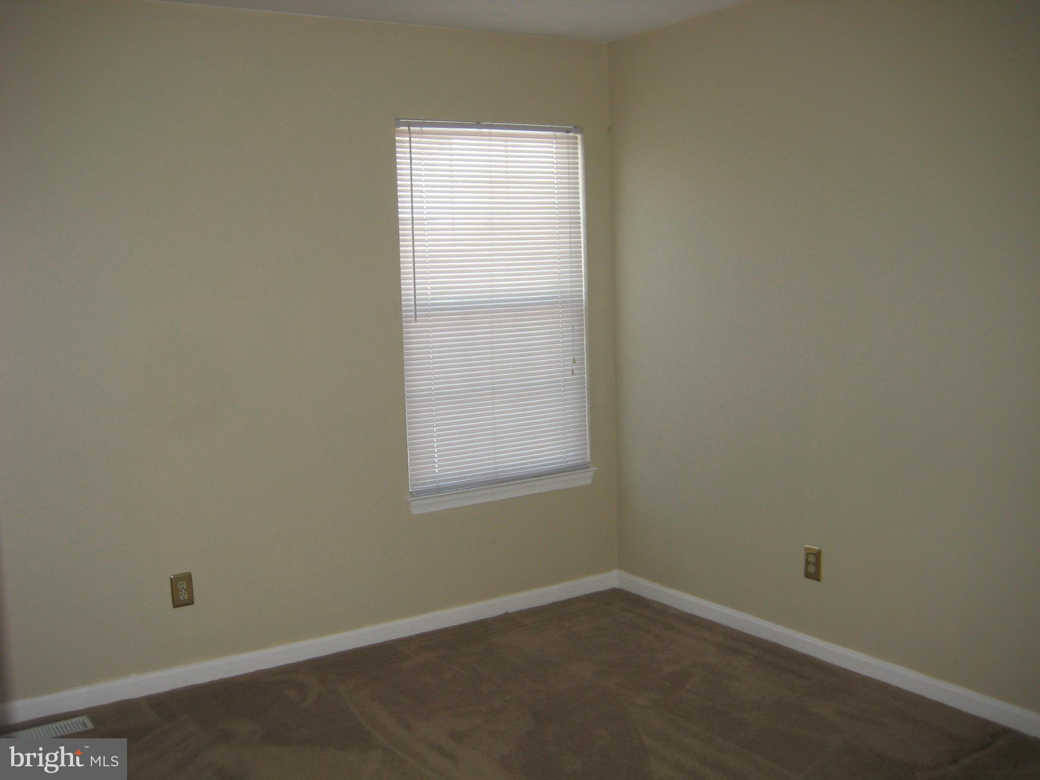 7304 Gunpowder Road Baltimore, MD 21220 - Photo 22 of 30 an empty room with a window