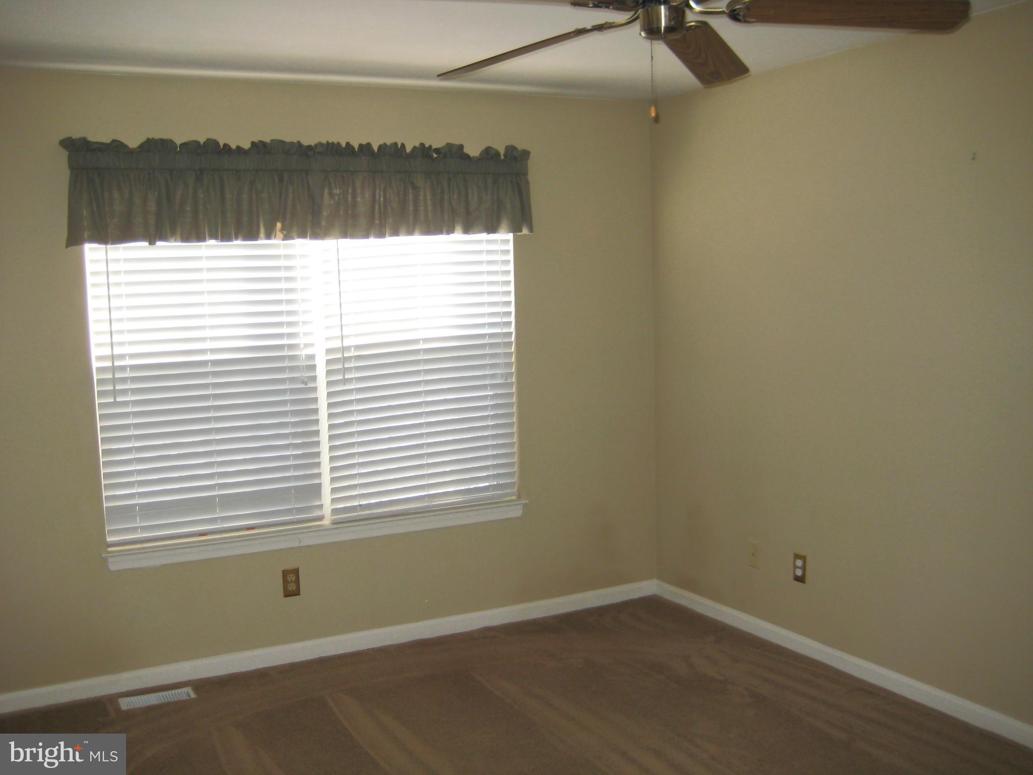 7304 Gunpowder Road Baltimore, MD 21220 - Photo 27 of 30 an empty room with a window