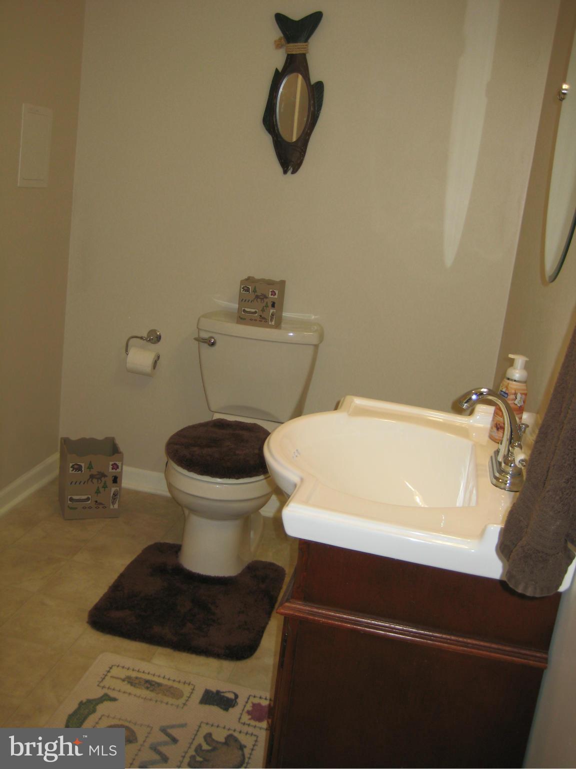 7304 Gunpowder Road Baltimore, MD 21220 - Photo 30 of 30 a bathroom with a toilet and a sink