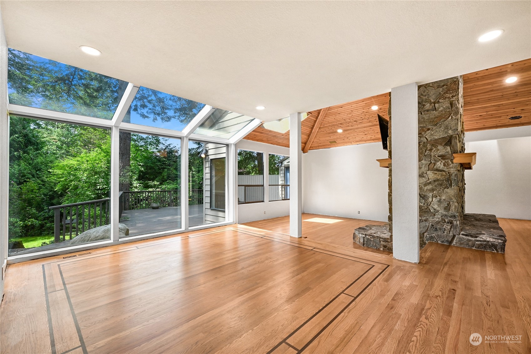 615 Canyon View Road Bellingham, WA 98225 - Photo 12 of 39 a view of empty room with wooden floor and fan