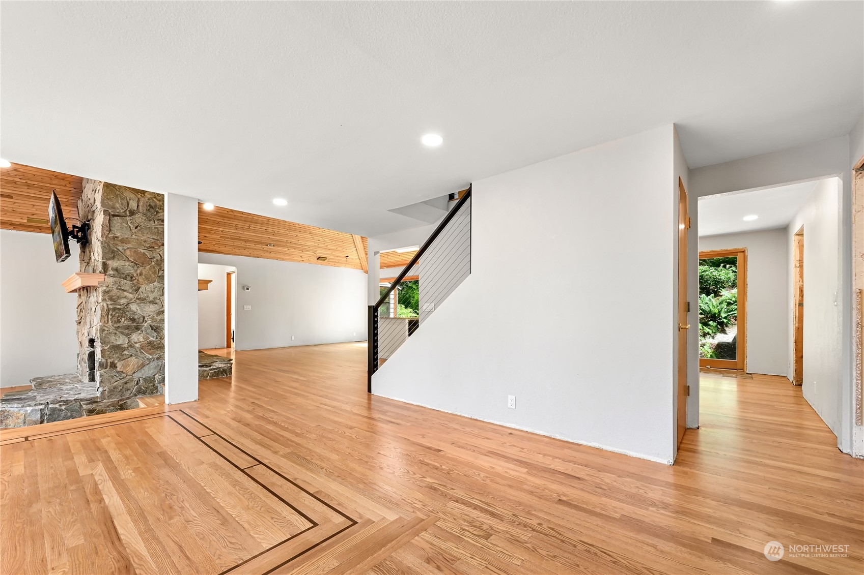 615 Canyon View Road Bellingham, WA 98225 - Photo 13 of 39 a view of a hallway with wooden floor and staircase