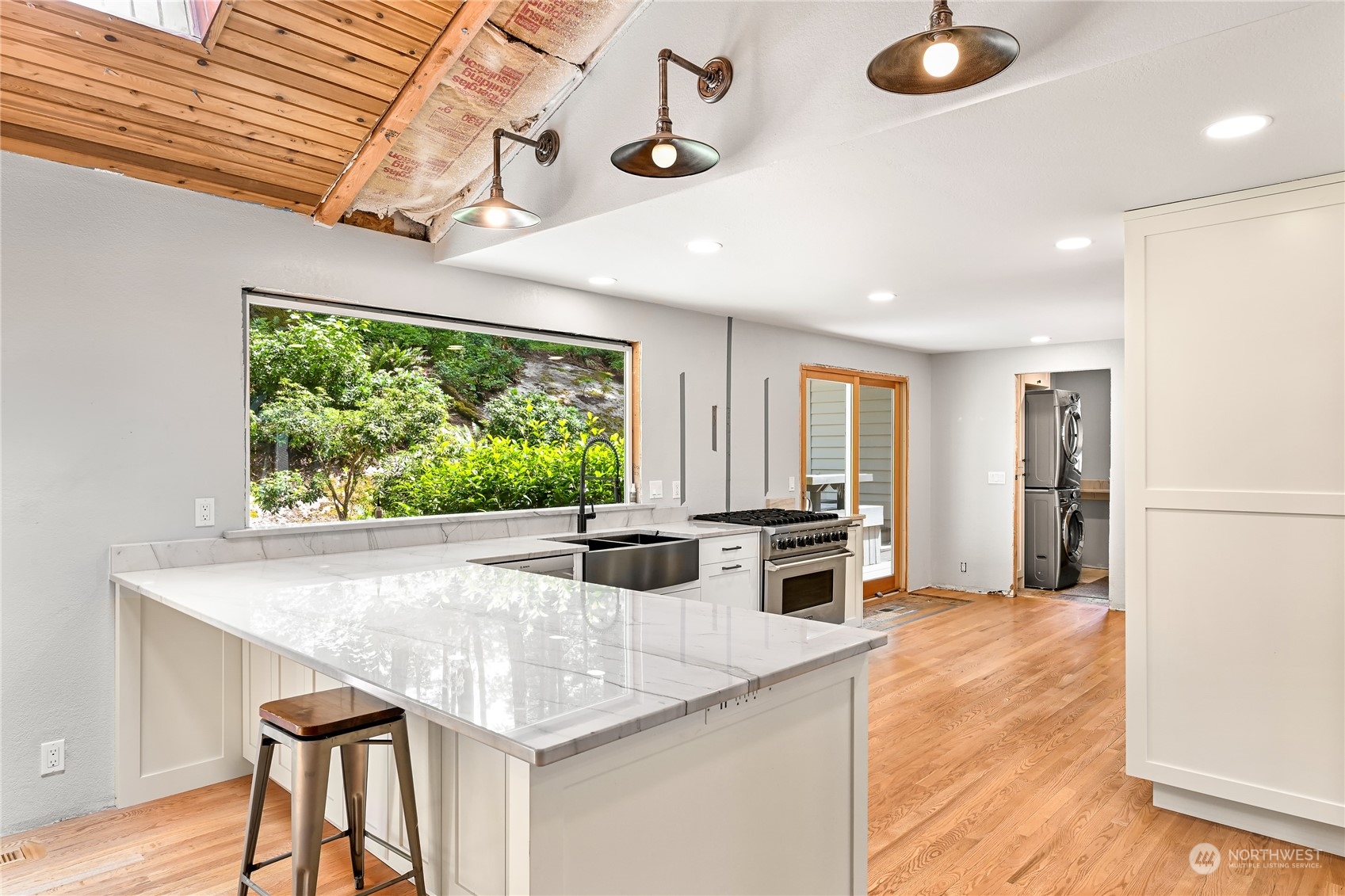 615 Canyon View Road Bellingham, WA 98225 - Photo 15 of 39 a kitchen with stainless steel appliances granite countertop a stove and refrigerator