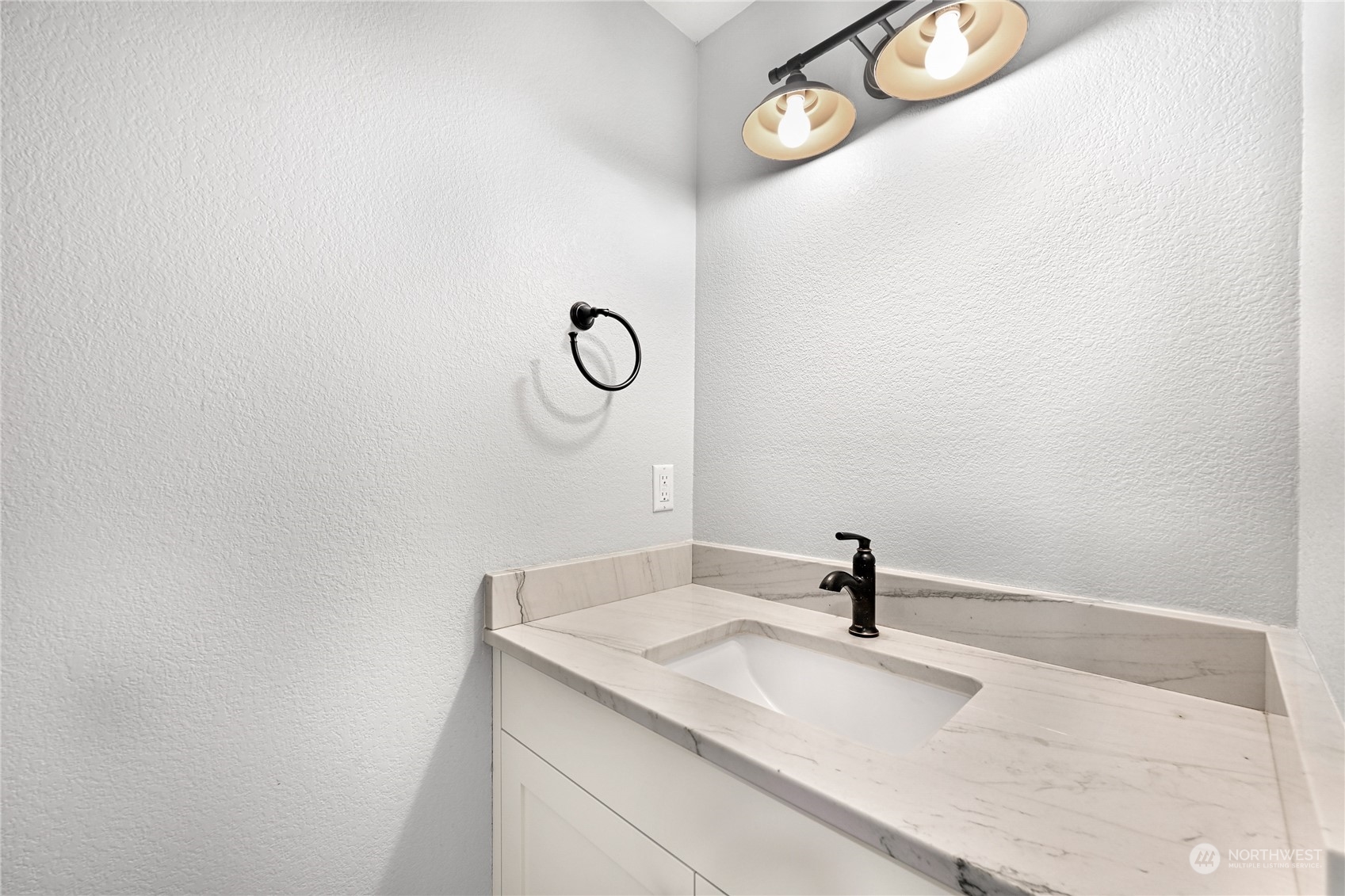 615 Canyon View Road Bellingham, WA 98225 - Photo 19 of 39 a bathroom with a sink and a mirror