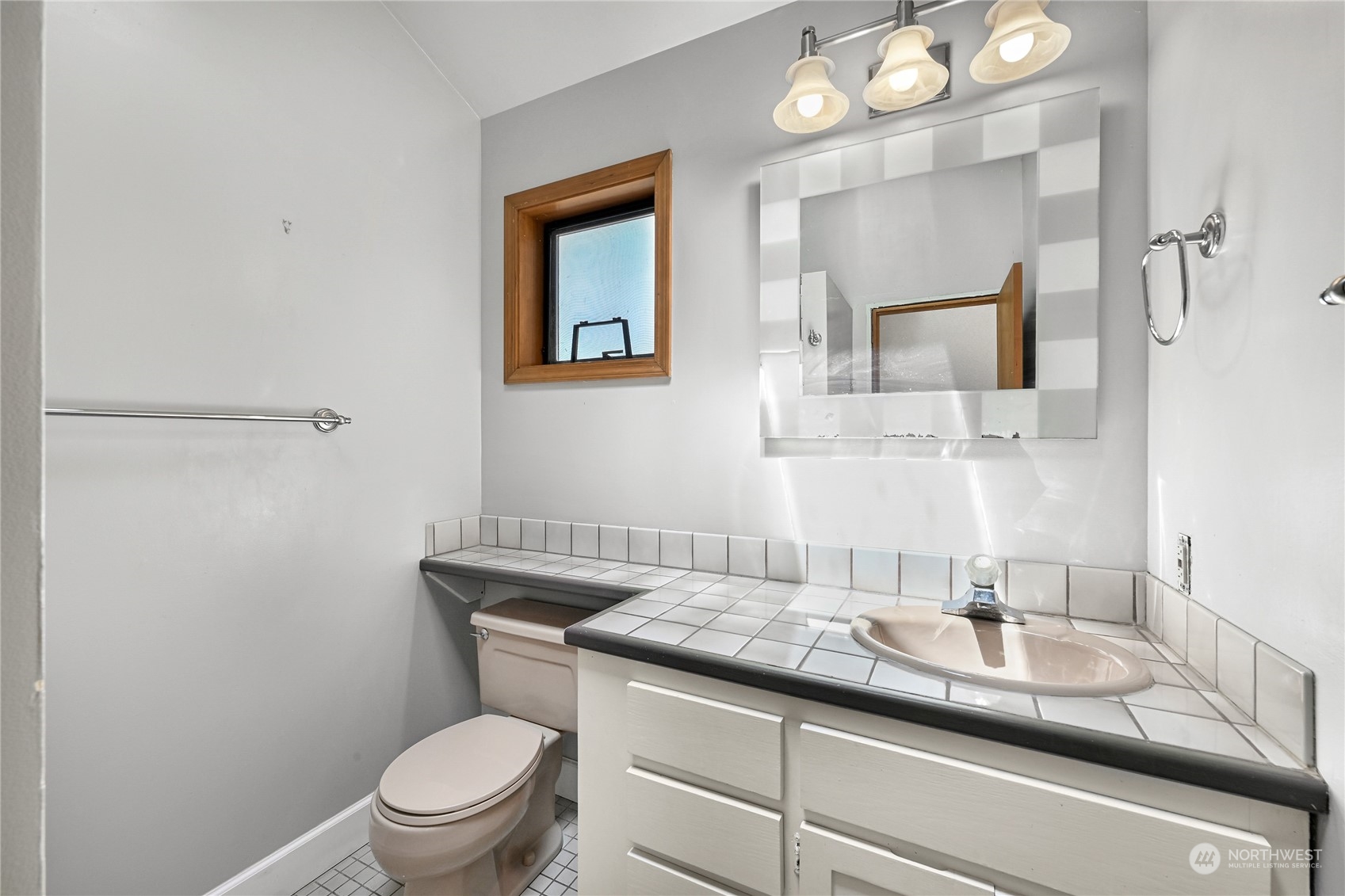 615 Canyon View Road Bellingham, WA 98225 - Photo 23 of 39 a bathroom with a granite countertop sink a toilet and mirror