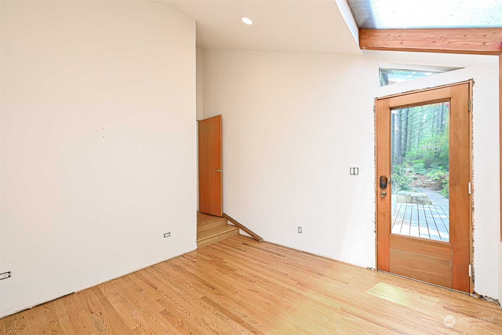 615 Canyon View Road Bellingham, WA 98225 - Photo 25 of 39 a view of empty room with wooden floor and fan