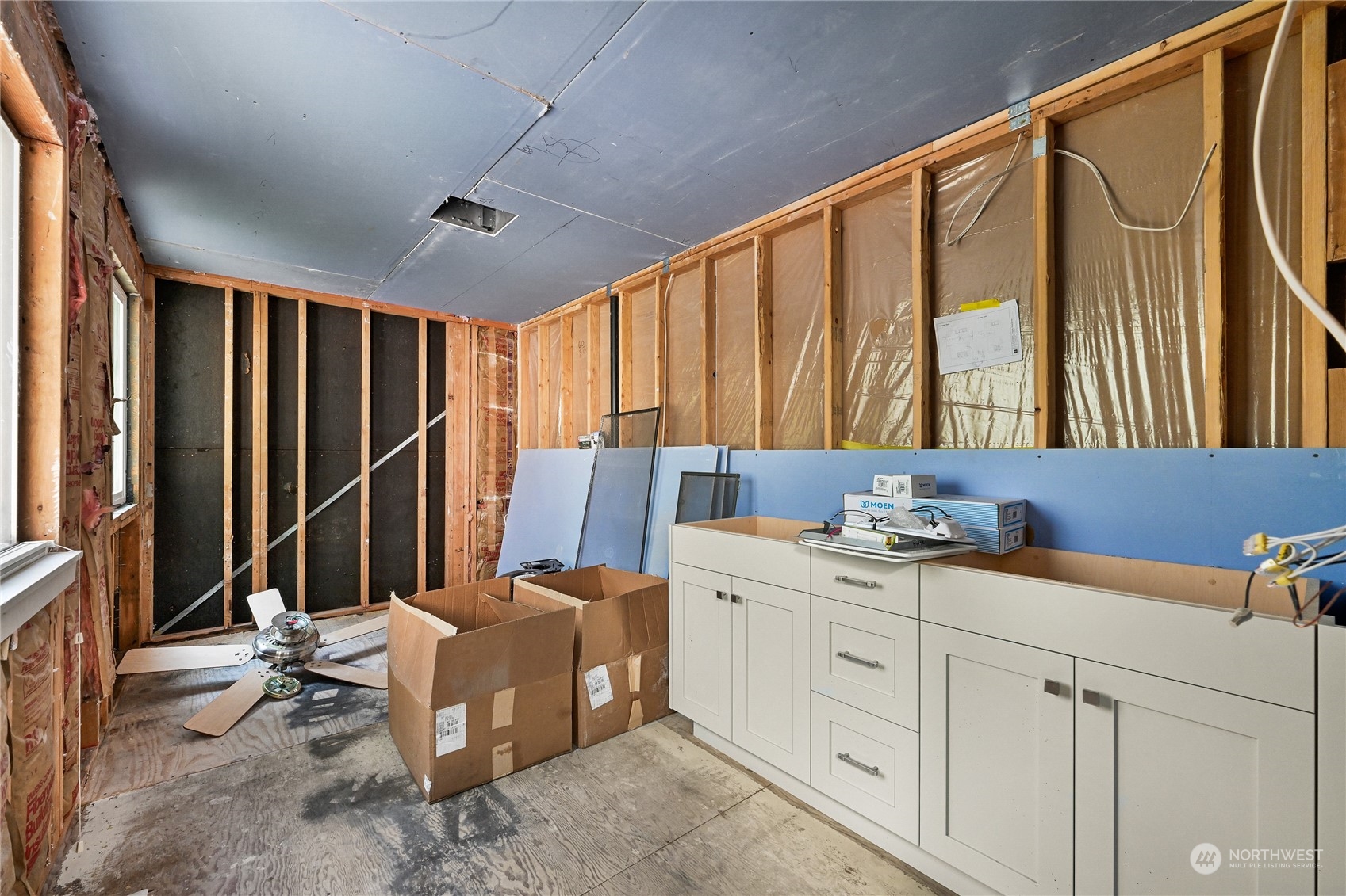 615 Canyon View Road Bellingham, WA 98225 - Photo 29 of 39 a bathroom with a granite countertop sink and a mirror