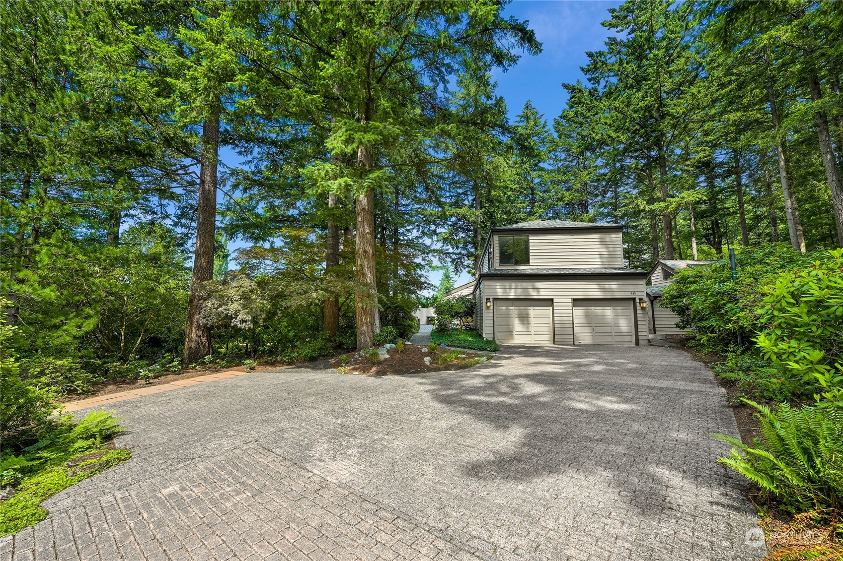 615 Canyon View Road Bellingham, WA 98225 - Photo 39 of 39 a pathway of a house with large trees