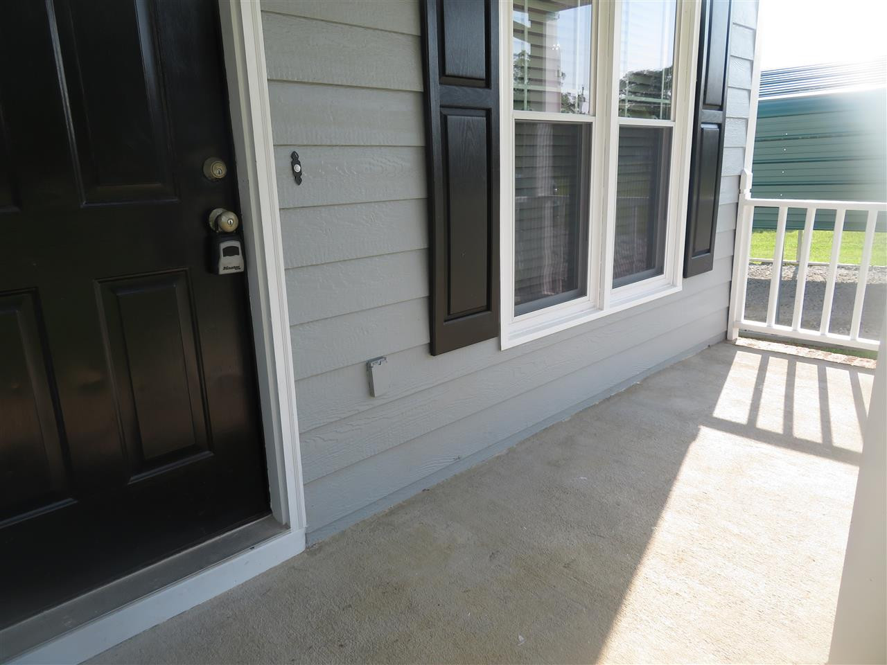 1872 Jack Road Clayton, NC 27520 - Photo 5 of 29 Concrete Front Porch