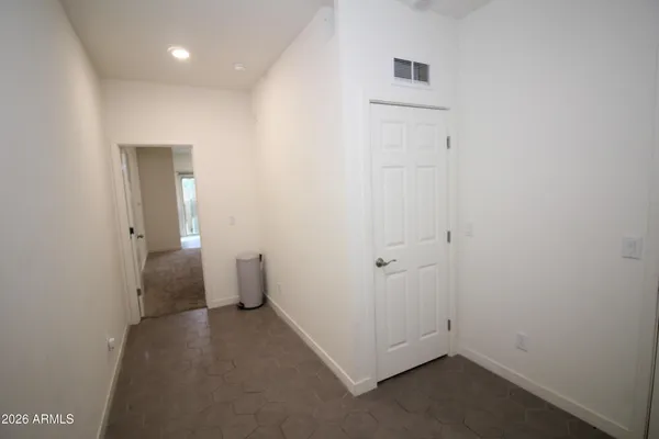 wooden floor and closet in a room