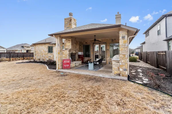 a front view of a house with a patio