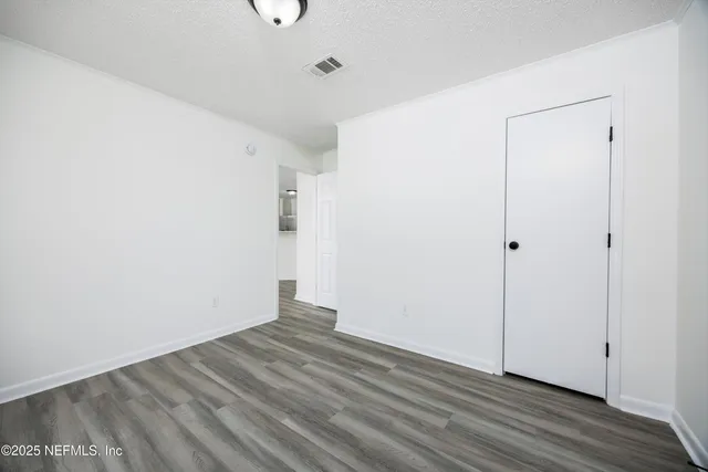 a view of small space with wooden floor