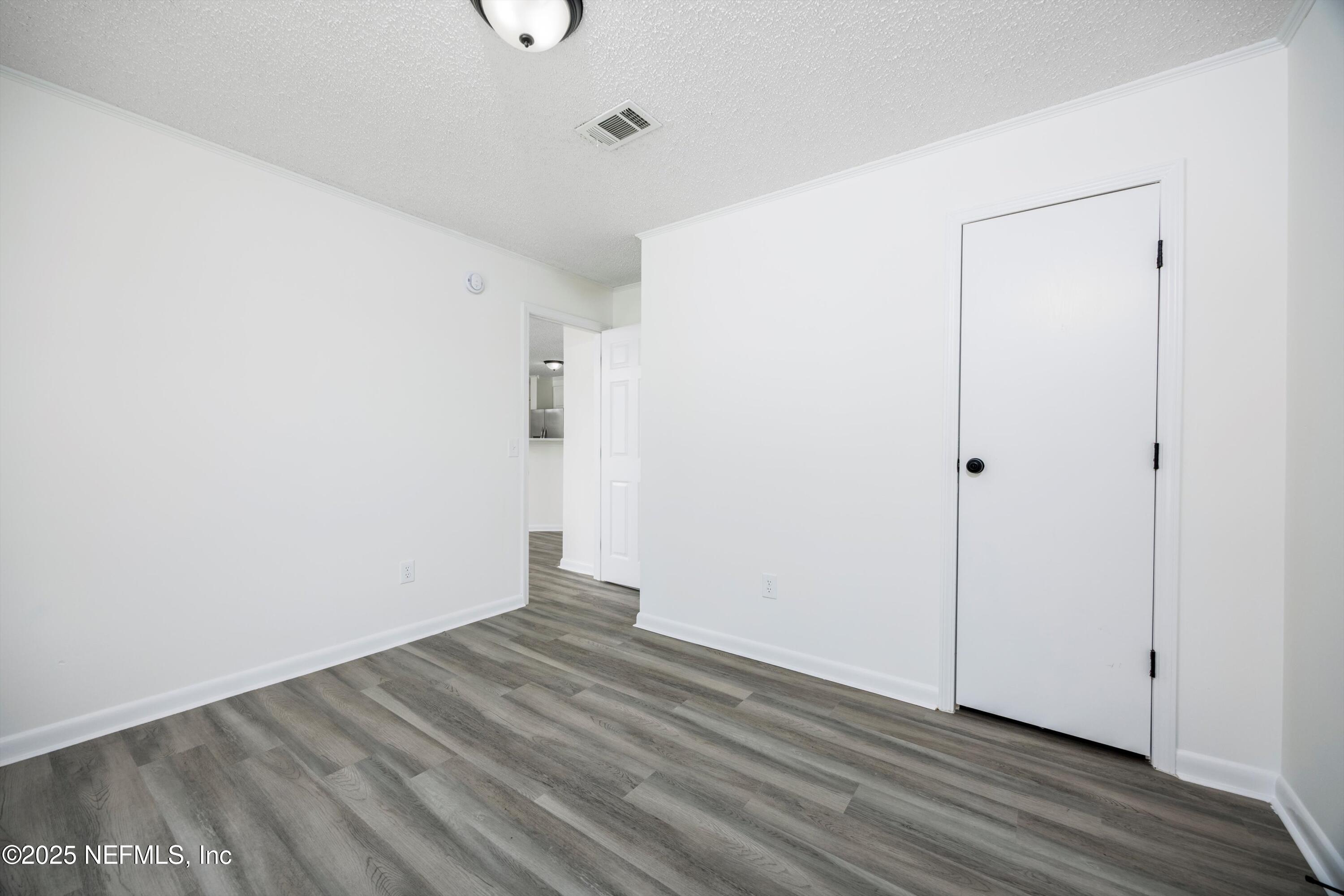 900 Helen Street St. Augustine, FL 32084 - Photo 22 of 30 a view of small space with wooden floor