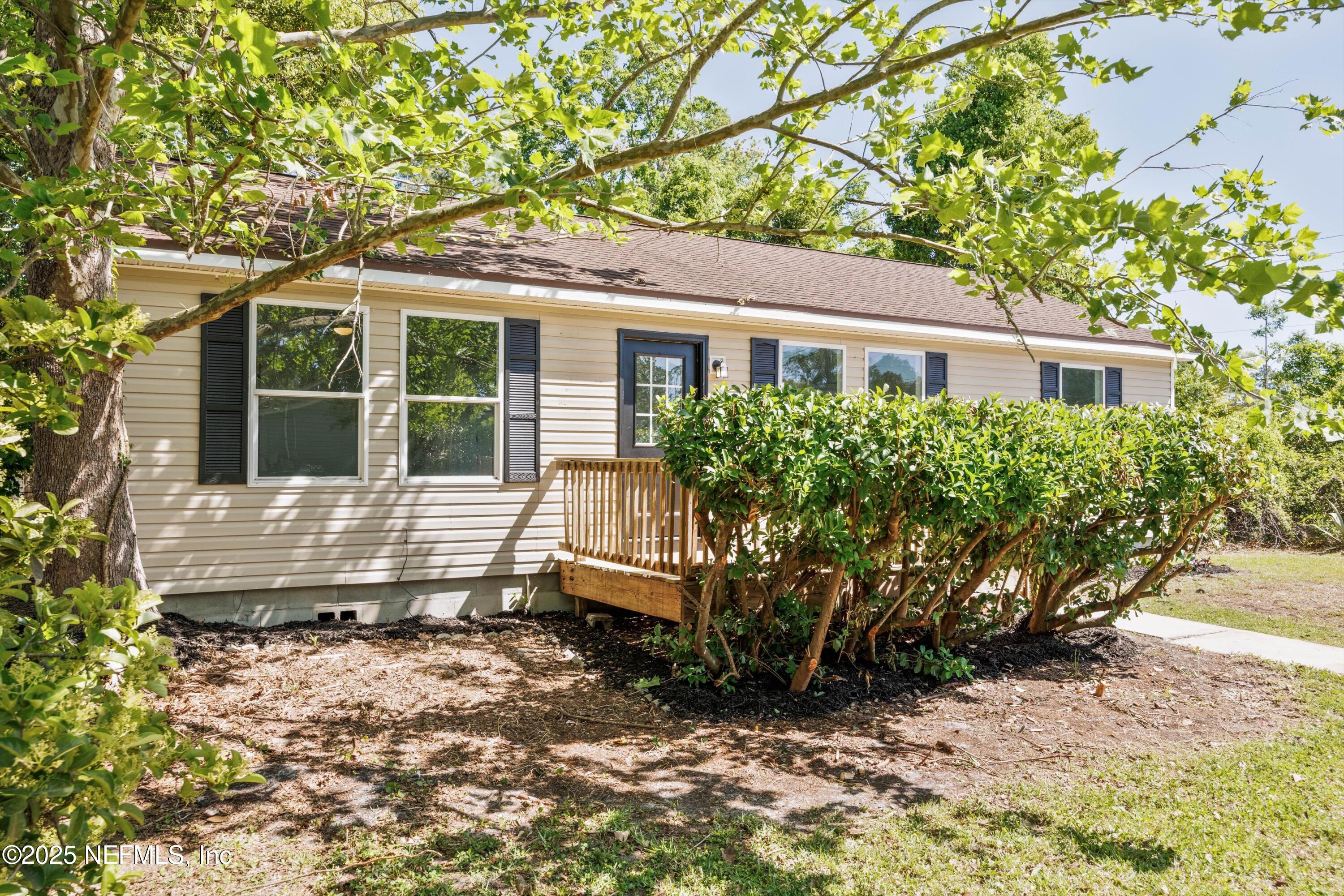 900 Helen Street St. Augustine, FL 32084 - Photo 25 of 30 a view of a house with a yard