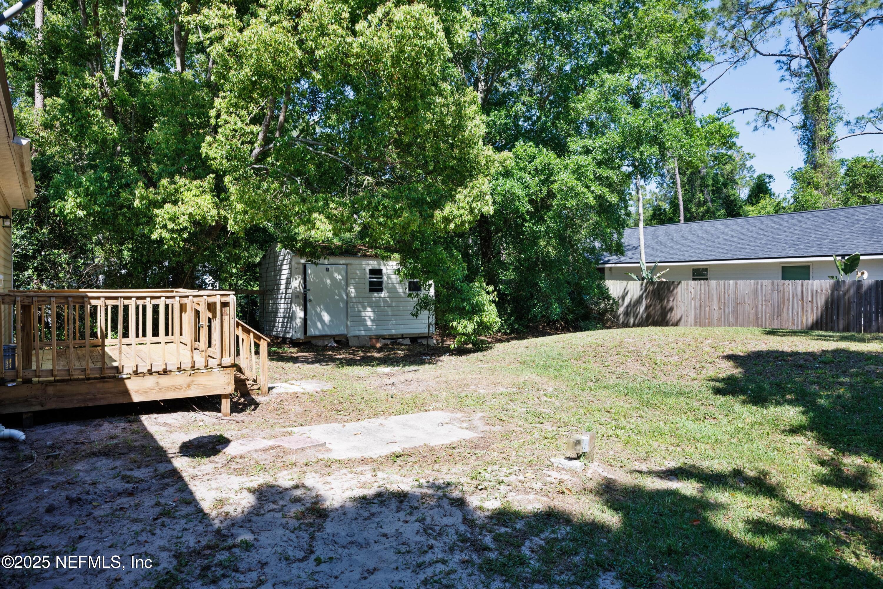 900 Helen Street St. Augustine, FL 32084 - Photo 26 of 30 a view of a house with a yard
