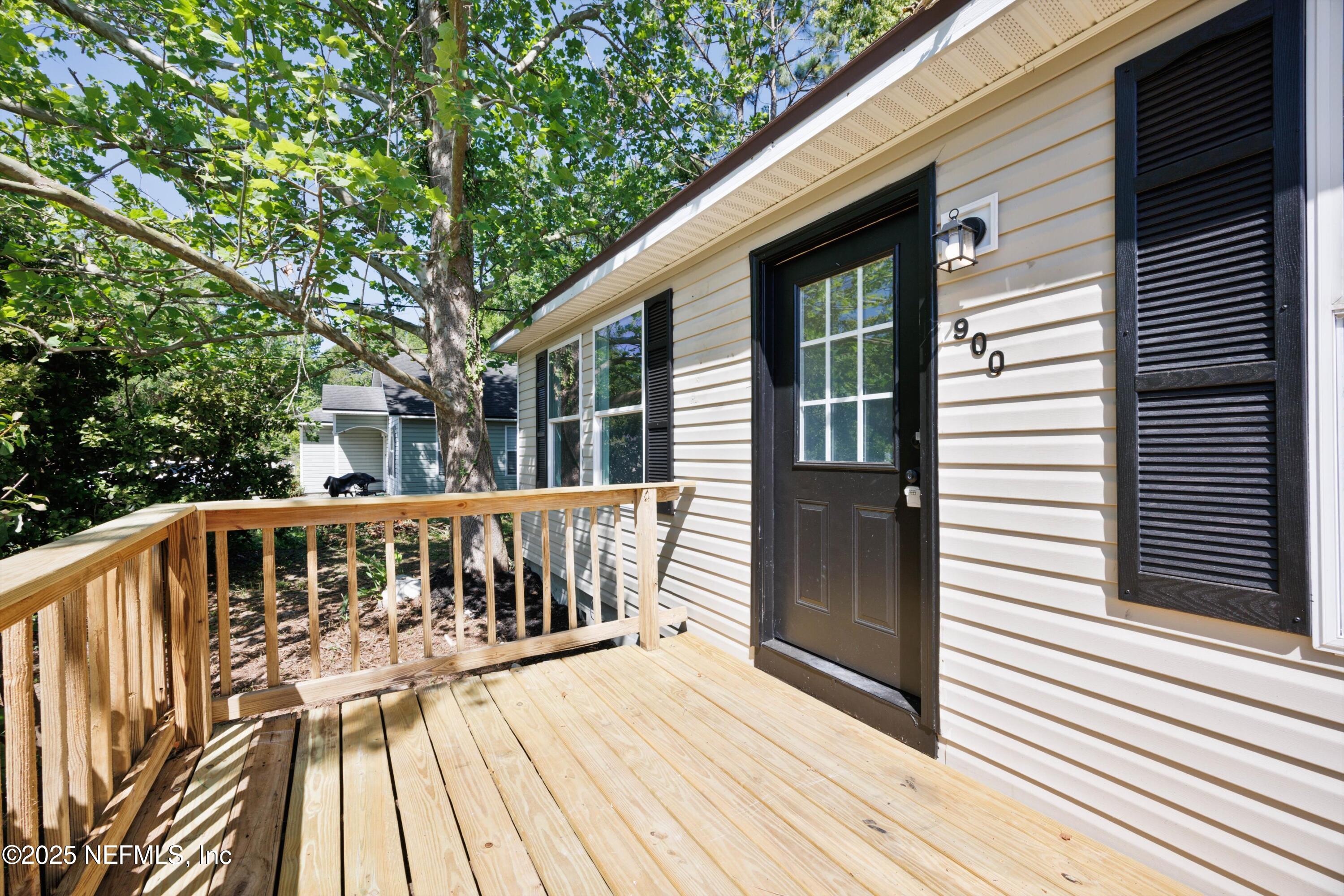 900 Helen Street St. Augustine, FL 32084 - Photo 27 of 30 a front view of a house with a balcony