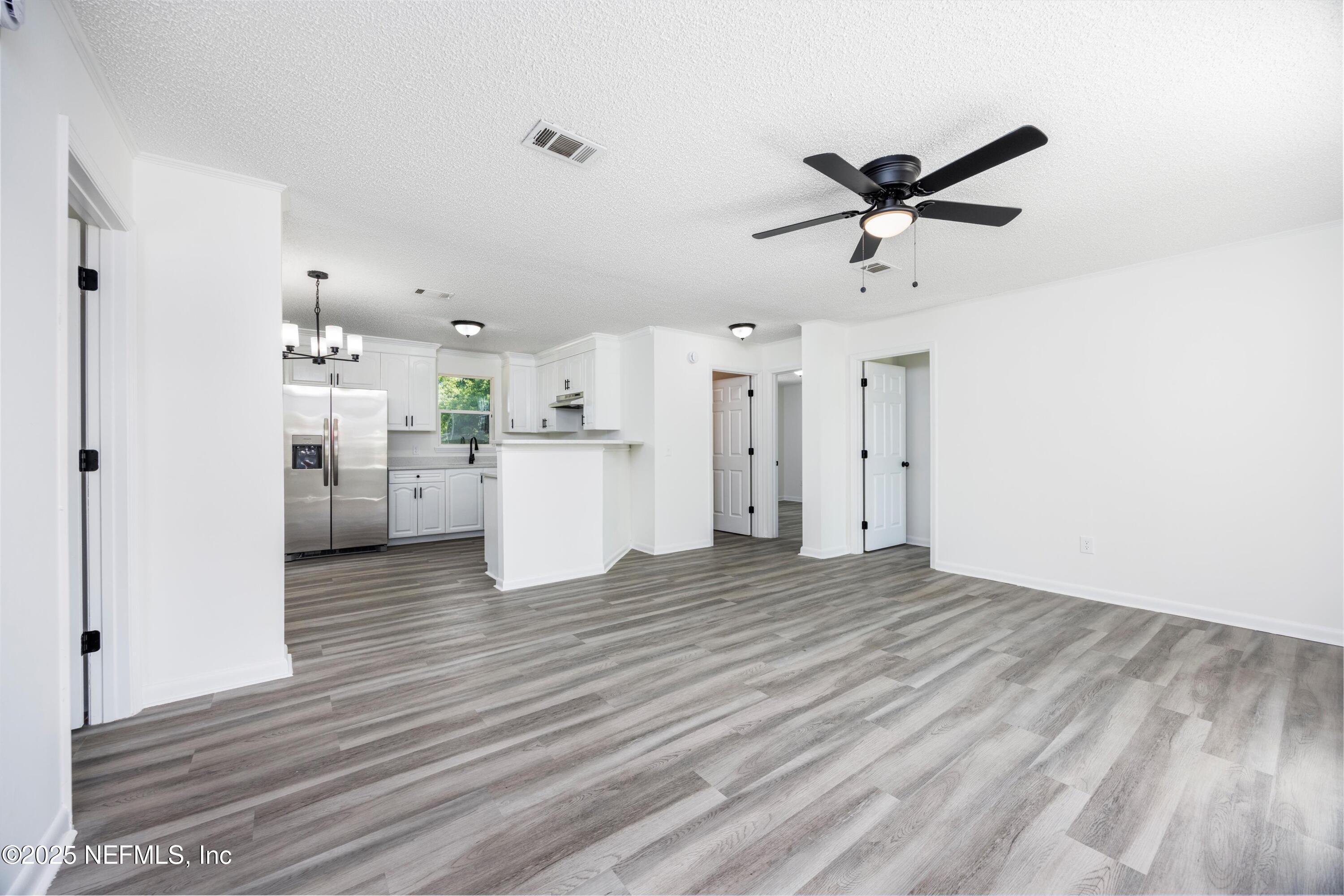 900 Helen Street St. Augustine, FL 32084 - Photo 6 of 30 a view of a kitchen with a sink and cabinet