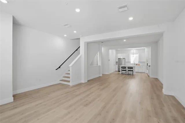 a stove top oven sitting inside of a kitchen