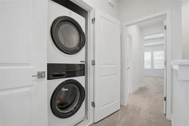 a spacious bathroom with a mirror sink and shower