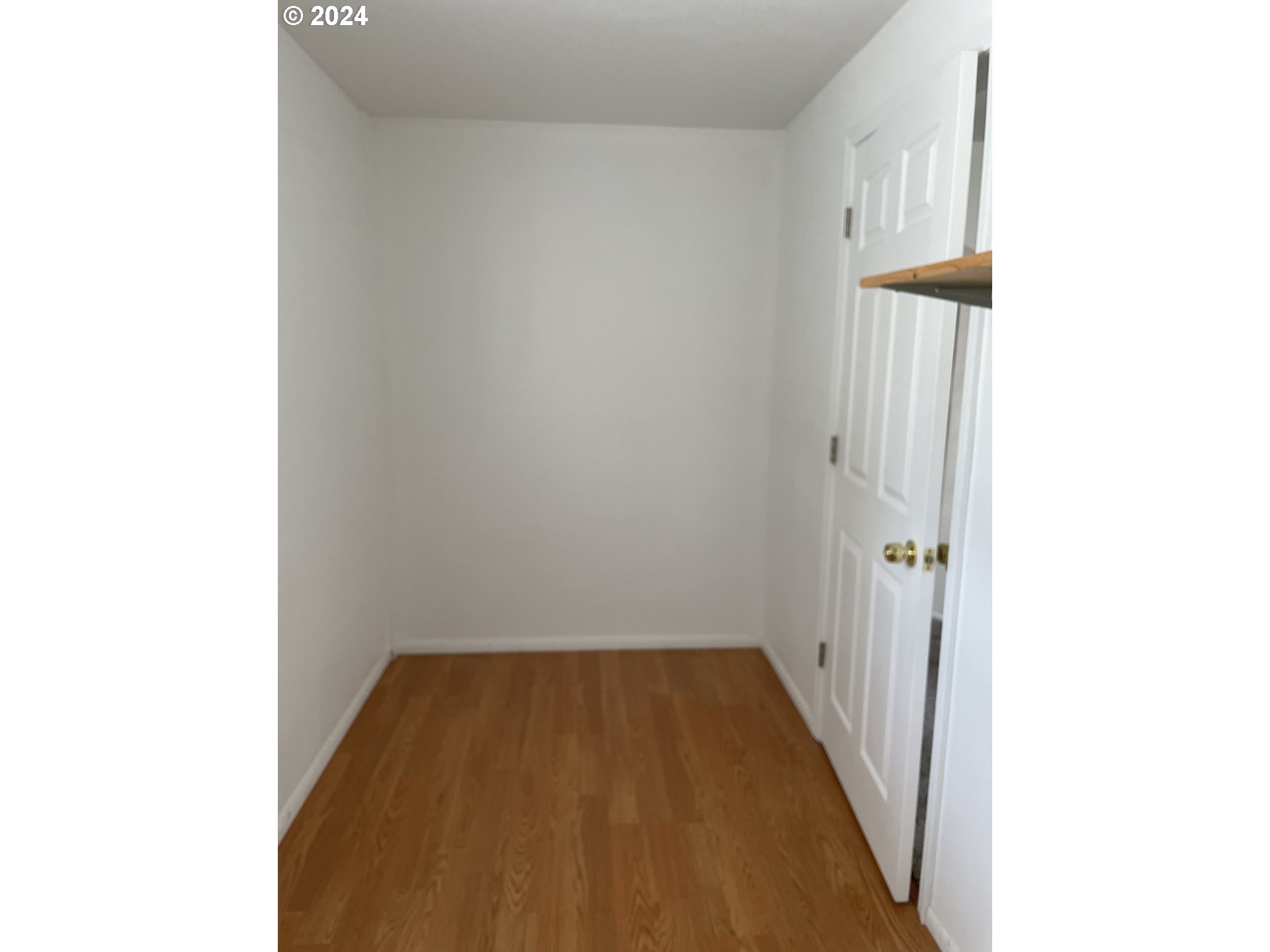206 Bourbon Street Florence, OR 97439 - Photo 10 of 28 a view of a room with wooden floor