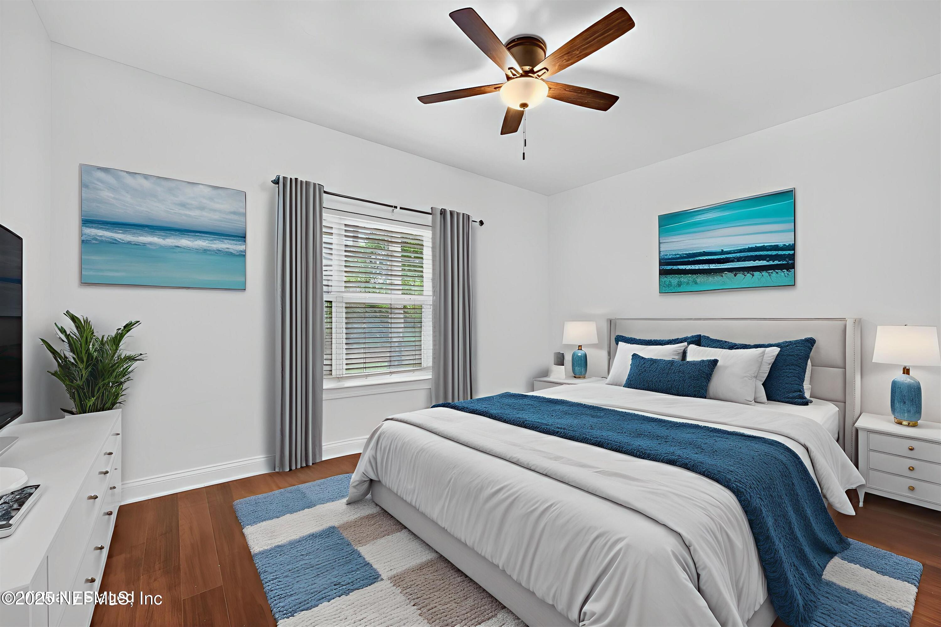 210 Presidents Cup Way, Unit 101 St. Augustine, FL 32092 - Photo 19 of 37 a bedroom with a large bed and a window