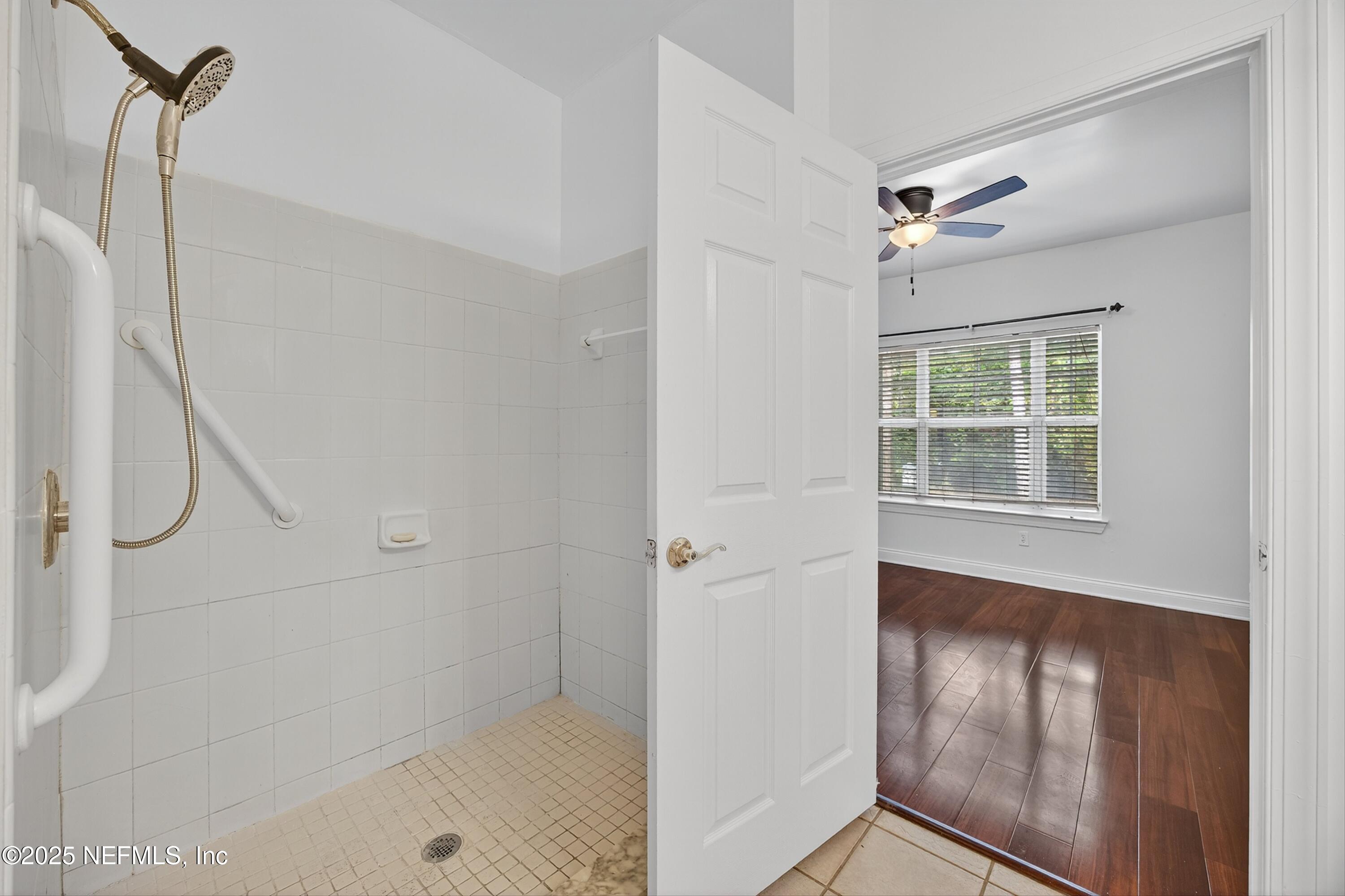 210 Presidents Cup Way, Unit 101 St. Augustine, FL 32092 - Photo 23 of 37 a view of an empty room with a window