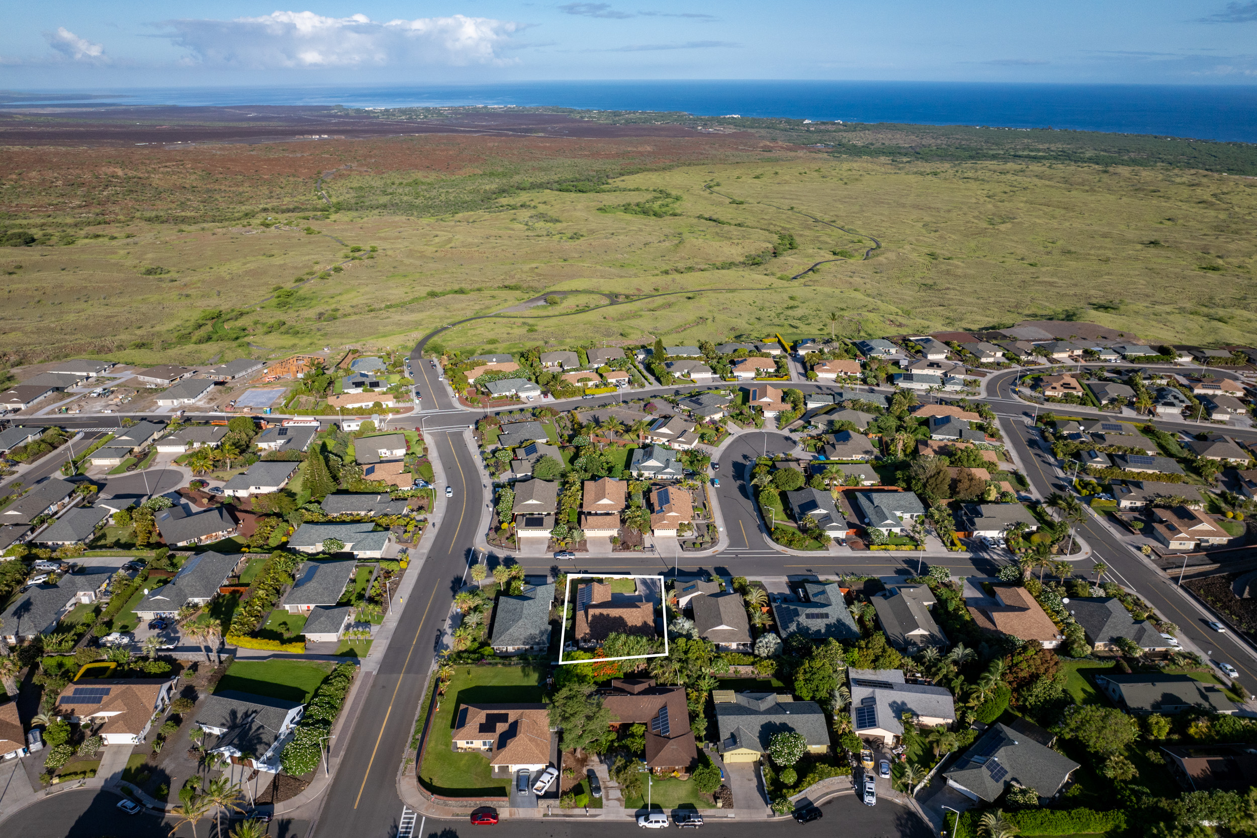 68-1693 Malie Street Waikoloa, HI 96738 - Photo 24 of 25 a view of an ocean with a nearby beach