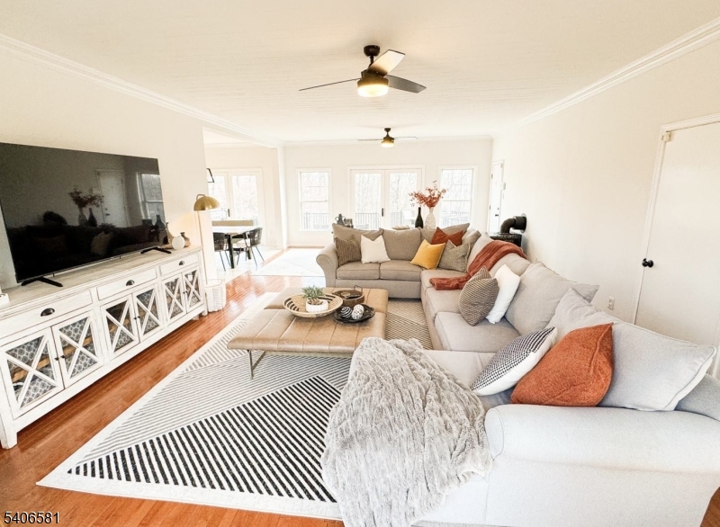 16 Gary Court Flanders, NJ 07836 - Photo 21 of 48 a living room with furniture and a flat screen tv