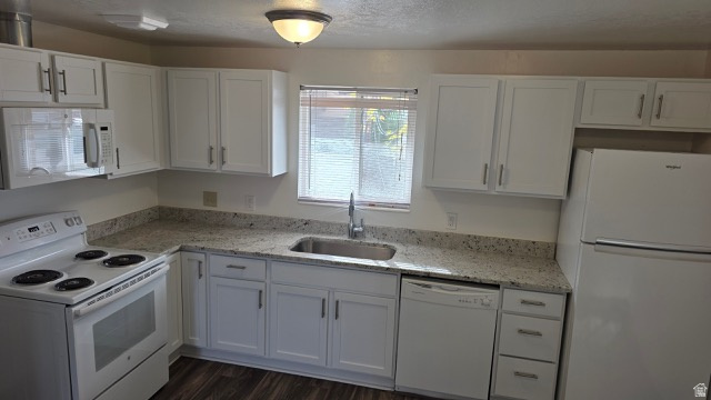 281 West 650 South Bountiful, UT 84010 - Photo 6 of 9 Updated kitchen in upstairs unit with white appliances and newer flooring