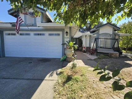 a house view with a outdoor space
