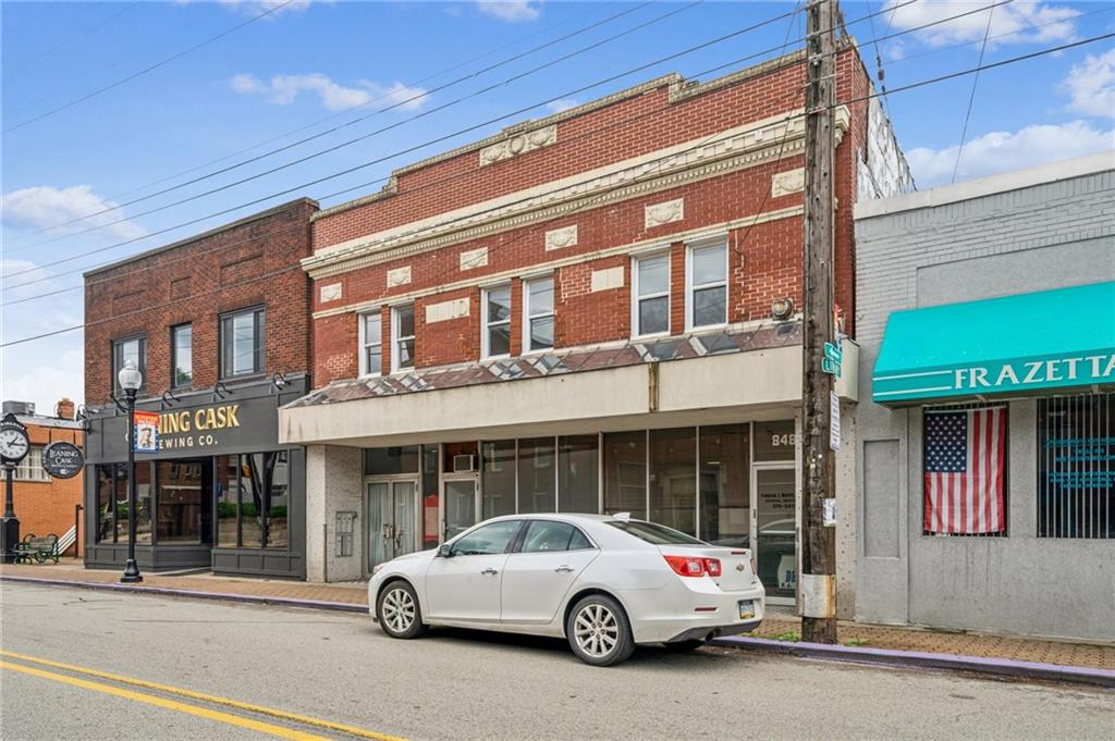 a car parked in front of a building