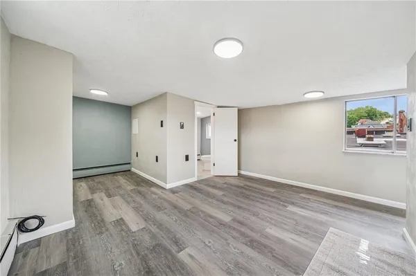 a view of a livingroom with wooden floor