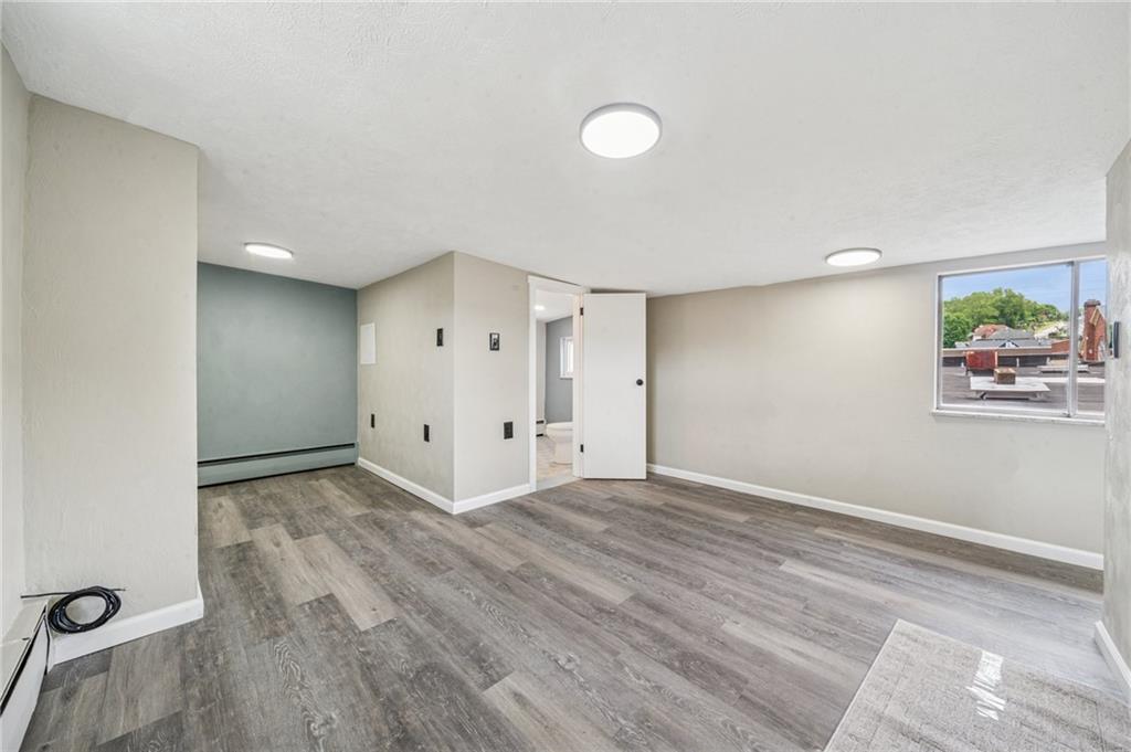 848 Pittsburgh Street Springdale, PA 15144 - Photo 13 of 25 a view of a livingroom with wooden floor