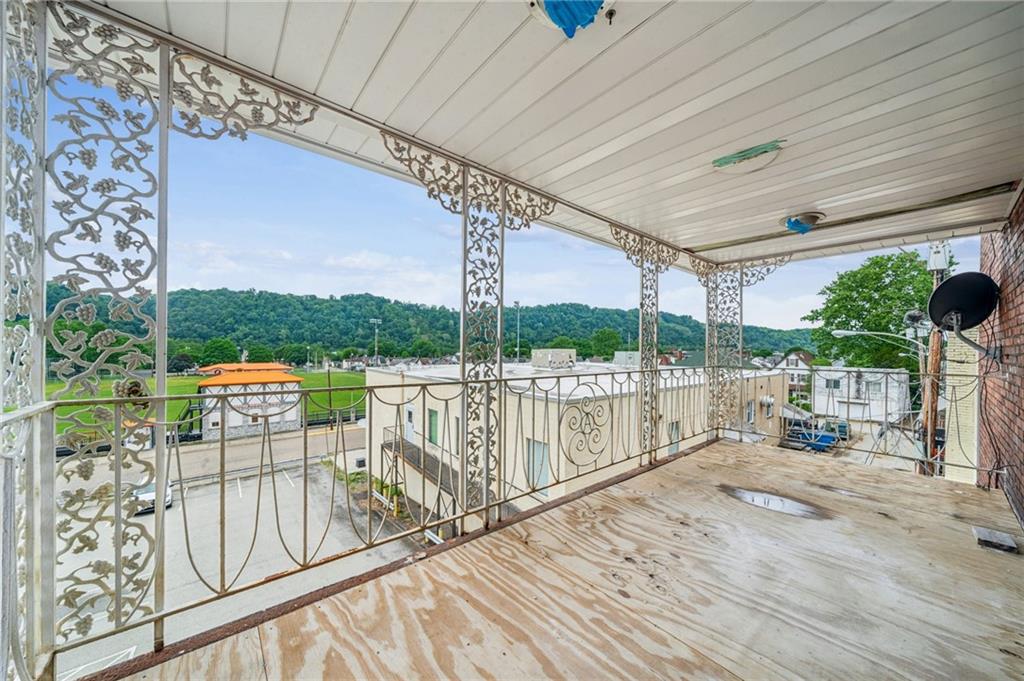 848 Pittsburgh Street Springdale, PA 15144 - Photo 21 of 25 a view of balcony with furniture