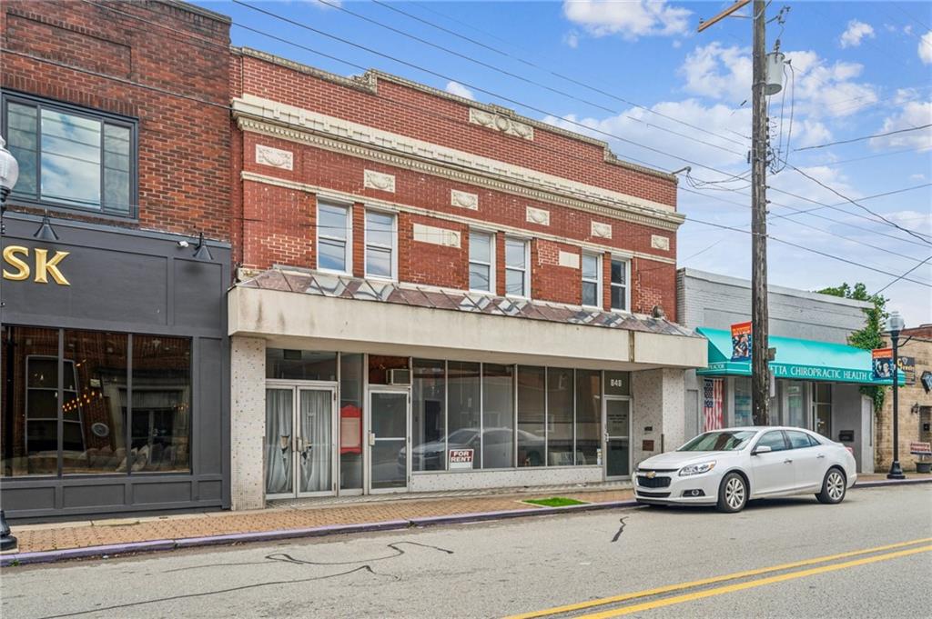 848 Pittsburgh Street Springdale, PA 15144 - Photo 22 of 25 a car parked in front of a building