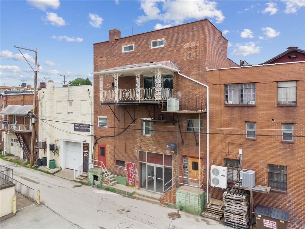 848 Pittsburgh Street Springdale, PA 15144 - Photo 25 of 25 a front view of a building with a street