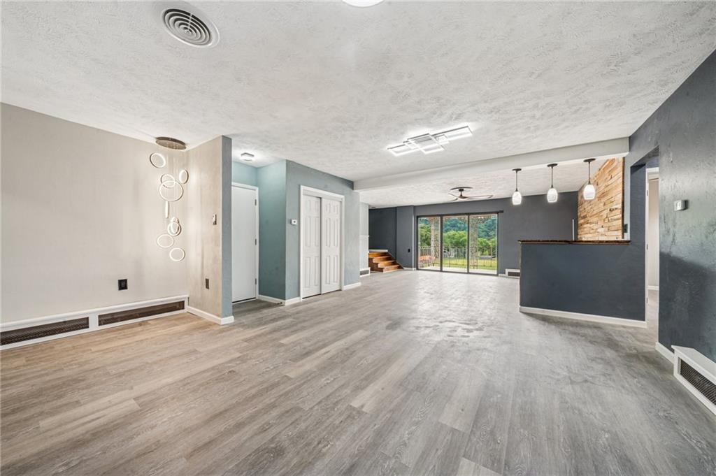 848 Pittsburgh Street Springdale, PA 15144 - Photo 10 of 25 a view of an empty room with a window