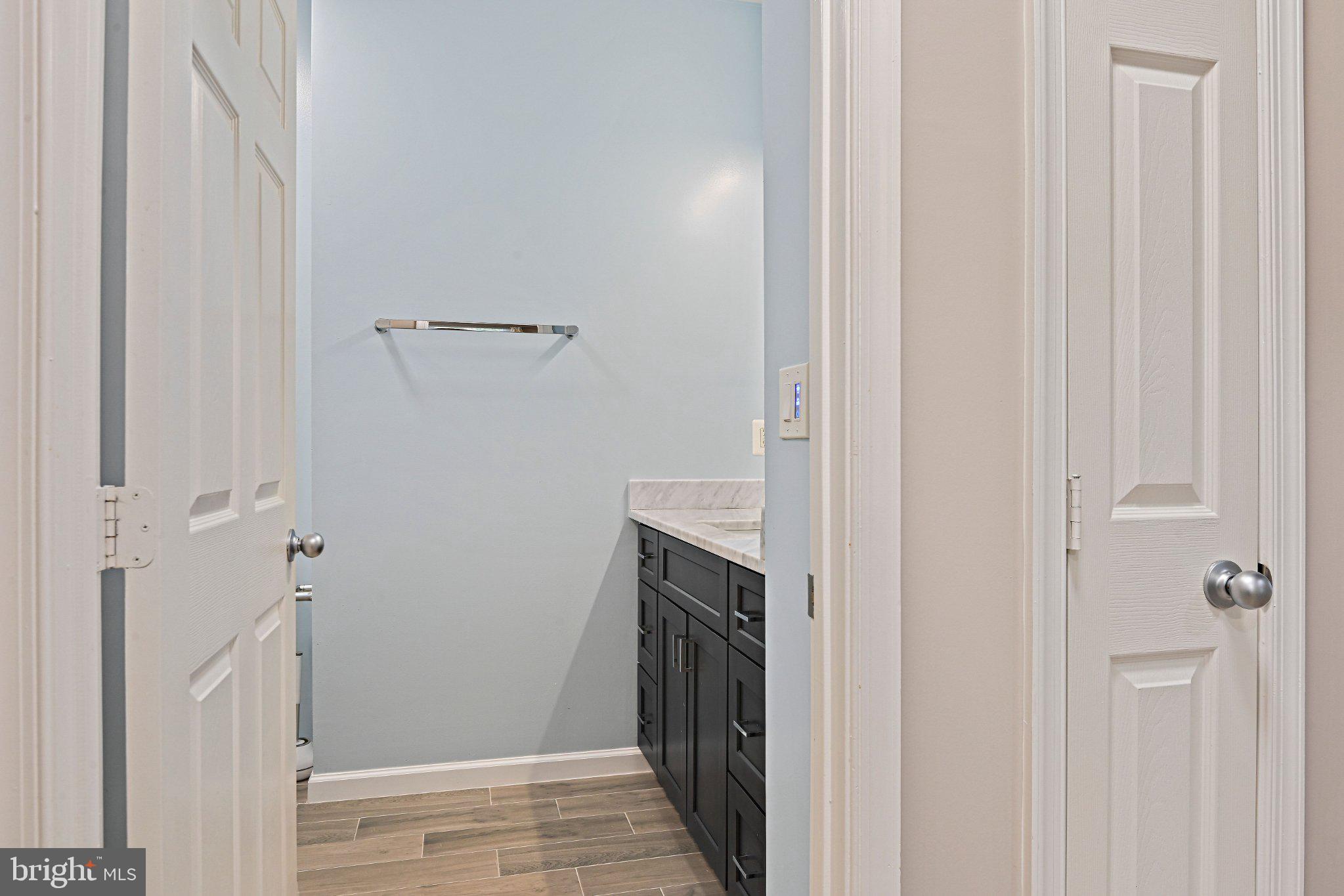 1519 North Point Drive, Unit 202 Reston, VA 20194 - Photo 21 of 49 Modern bathroom with serene hues.