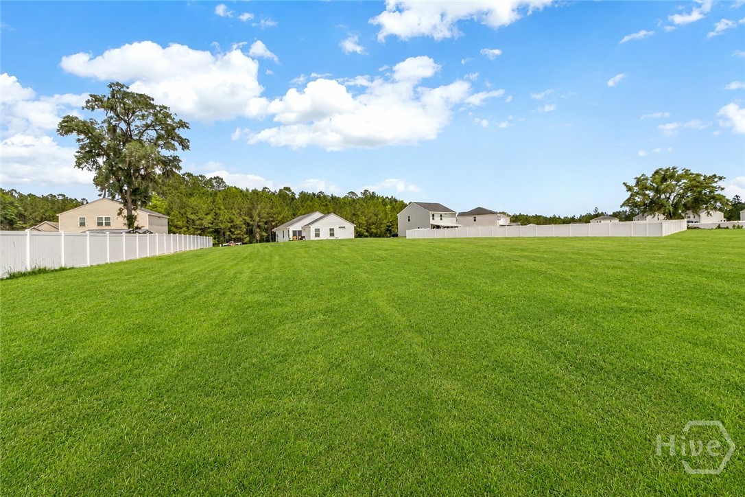 1166 Wilkins Road Midway, GA 31320 - Photo 24 of 28 Backyard - Grass Virtually Enhanced