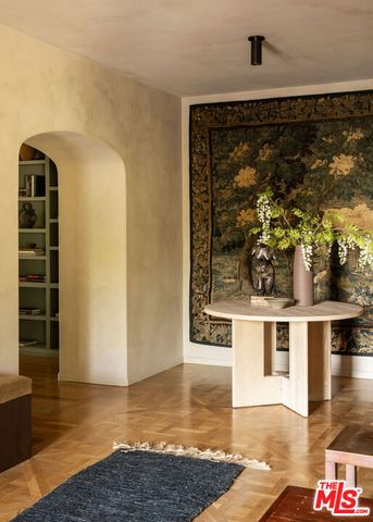 a view of a living room with a rug