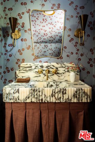 a bedroom with bed and window