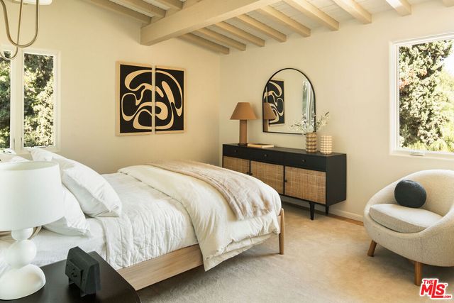 a workspace with a wooden floor and a stool