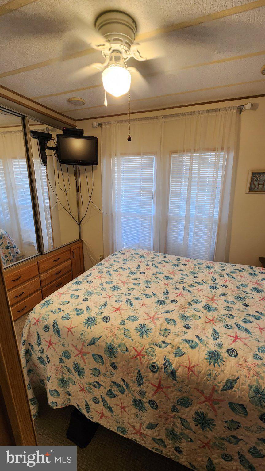 111 Beach Harbor Road, Unit 194C Grasonville, MD 21638 - Photo 18 of 24 Cozy retreat with natural light.